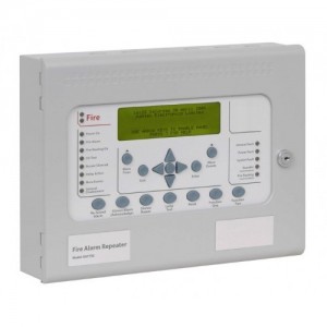 Photo of a Kentec Syncro View Repeater Panel. It's a grey box with a white front, a green rectangular screen and buttons signalling different functions in the panel.